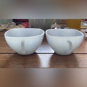 Two blue milk glass coffee-tea cups.  Beautiful and look unused.  No stain. EC